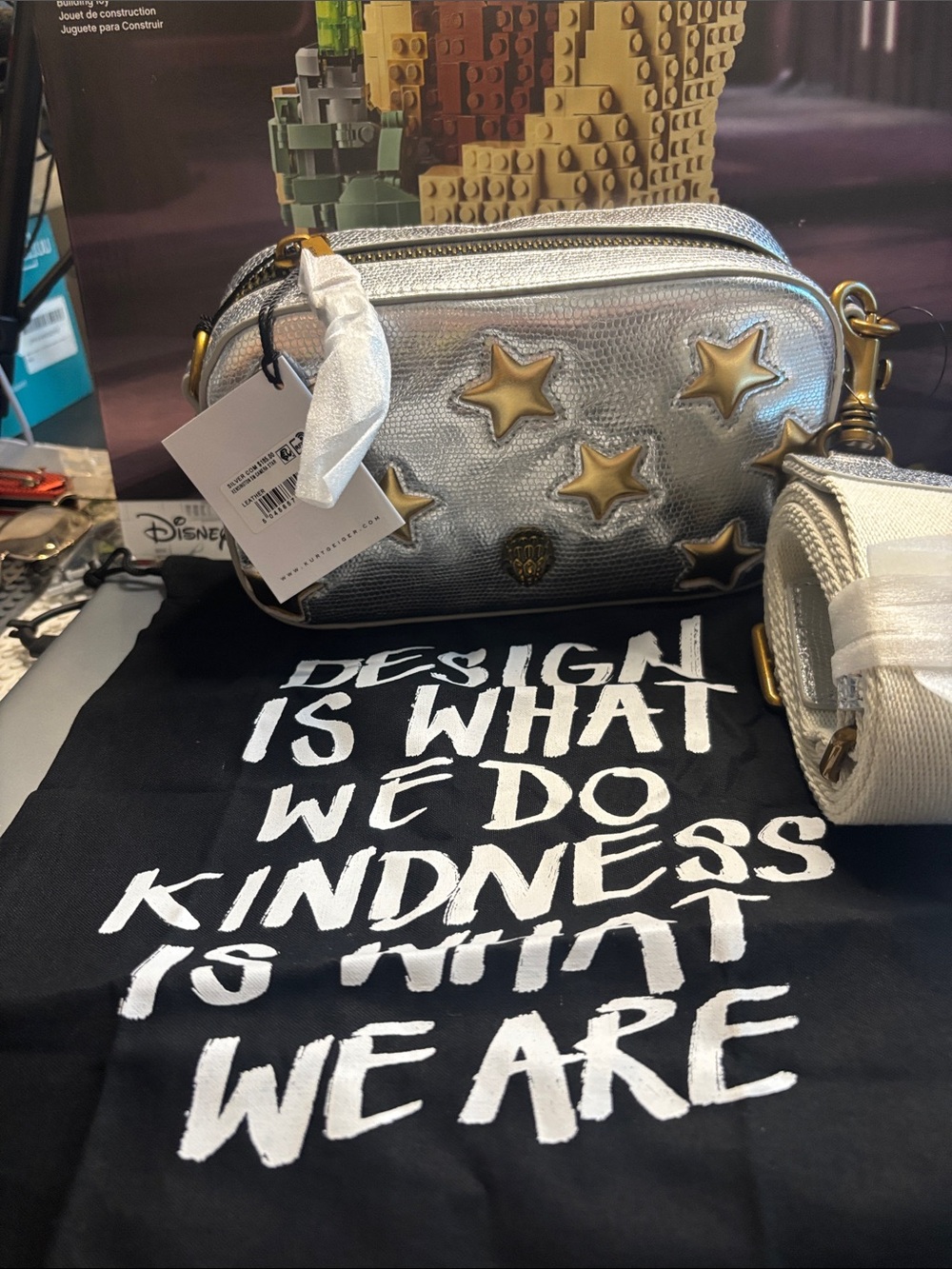 Kurt Geiger Silver Crossbody with Gold Star Accents
